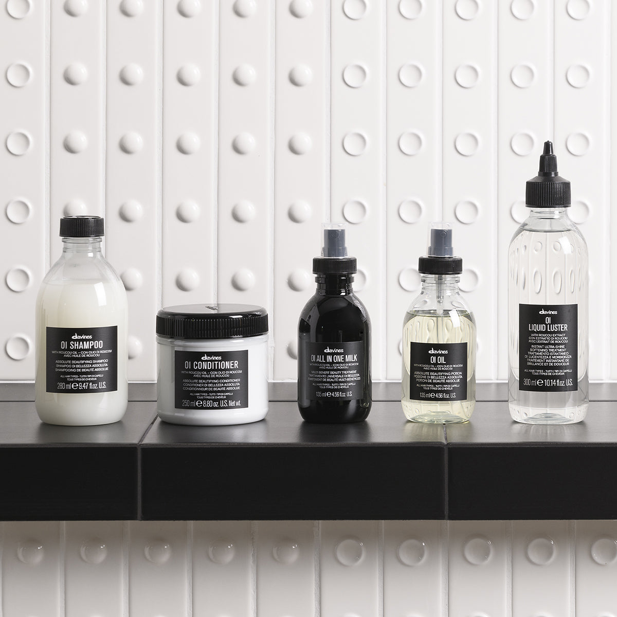 Davines International OI All In One Milk - Leave-in hydrating treatment controls frizz, protects from heat, and adds shine and softness
